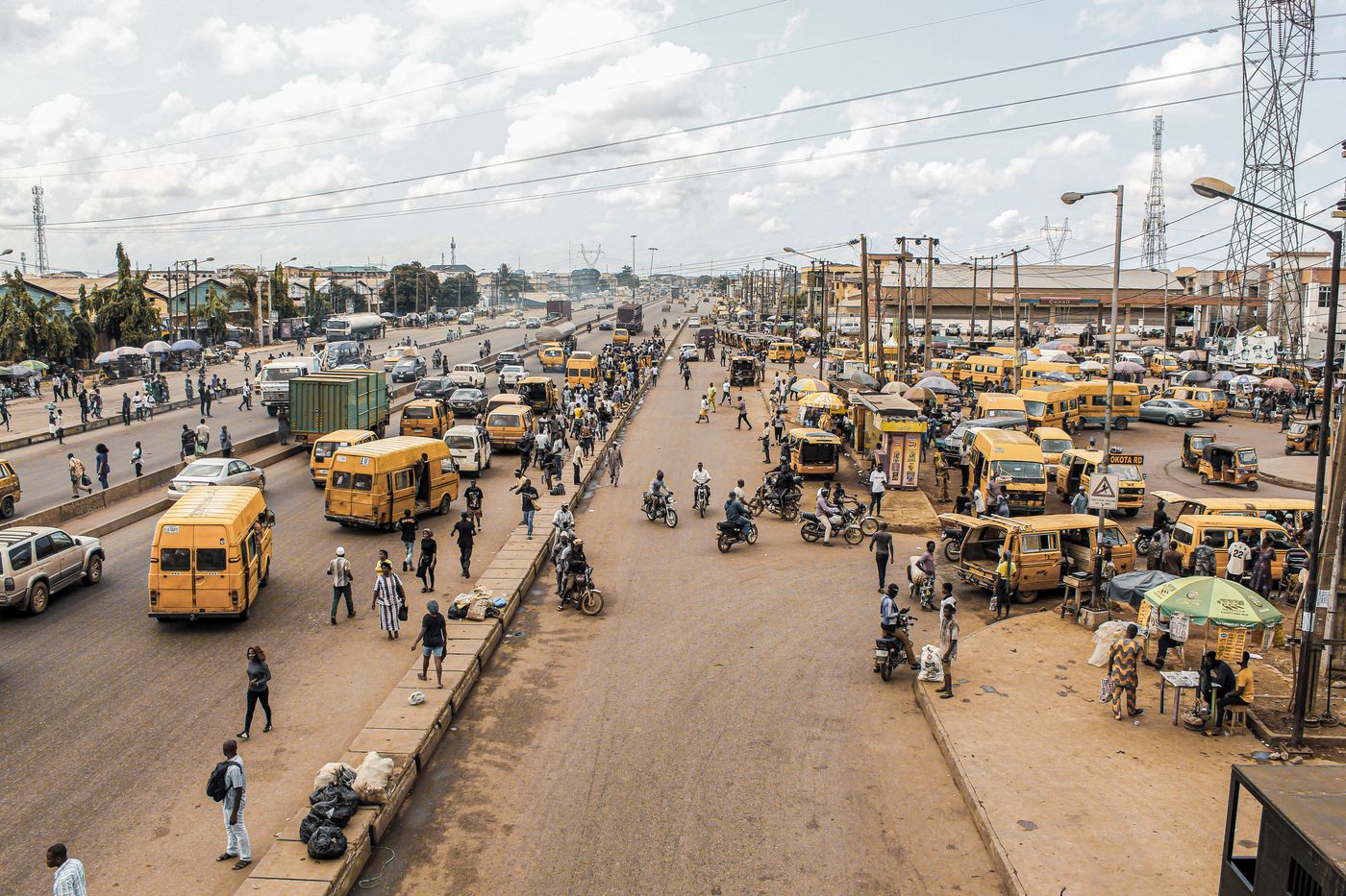 A Lagos street with yellow buses
